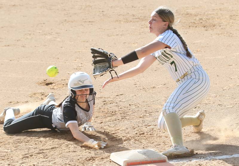 Woodland/Flanagan-Cornell's Kaiden Connor dives back into the bag at first base as St. Bede's Maci Kelly catches the throw on Monday, April 29, 2024 at St. Bede Academy.