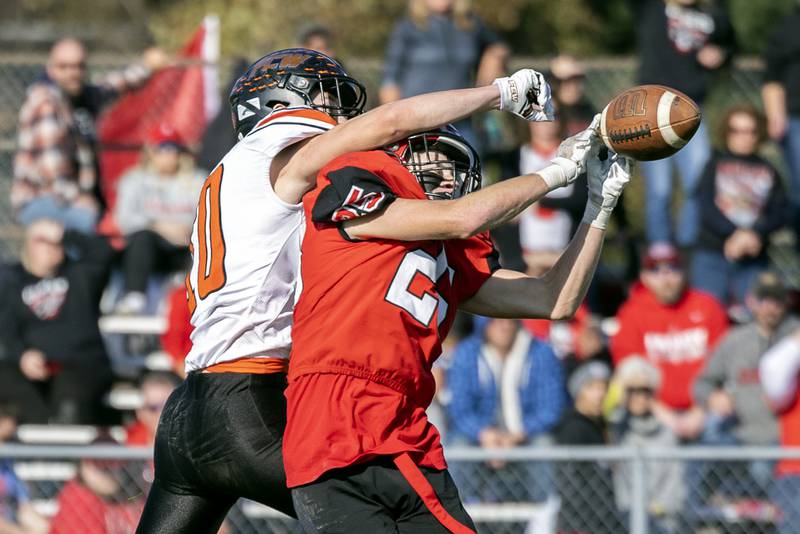 Amboy’s Brayden Klein breaks up a pass against FCW’s Payton Quaintance Saturday, Nov. 4, 2023 in the 8-man semifinal game in Amboy.