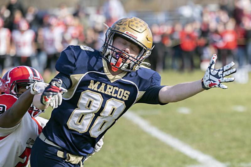 Polo’s Nathaniel Yingling reaches but is short on making a catch against Amboy Saturday, Nov. 11, 2023 during a semifinal 8-man football game in Polo.
