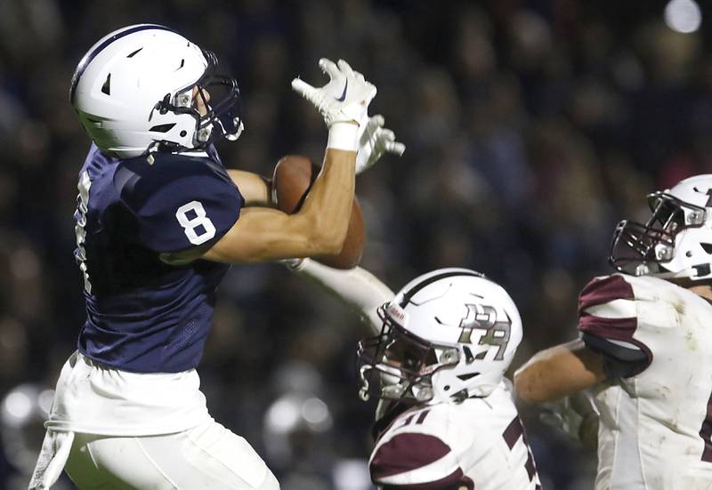 Prairie Ridge's Andrew Czarnecki breaks up a pass intended for Cary-Grove's Andrew Prio during a Fox Valley Conference football game on Friday, Sept. 22, 2023, at Cary-Grove High School in Cary.