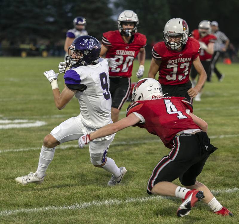 Dixon’s Collin Scott turns for yards after making a catch against Stillman Valley Friday, August 25, 2023.