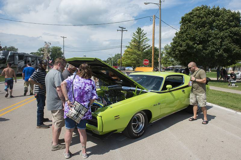 Colorful rides with gleaming chrome and big engines lined the streets of Amboy Sunday, Aug. 28, 2022 for their annual Depot Days car show. The show brings car owners and fans from all over the region to check out the mobile works of art and try they luck at the big 50/50 raffle pot.