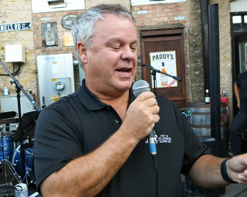 Mayor of St. Charles Clint Hull reads the third-place winner of the 50/50 on Thursday Aug. 21, 2025, held at Whiskey Bend in St. Charles.