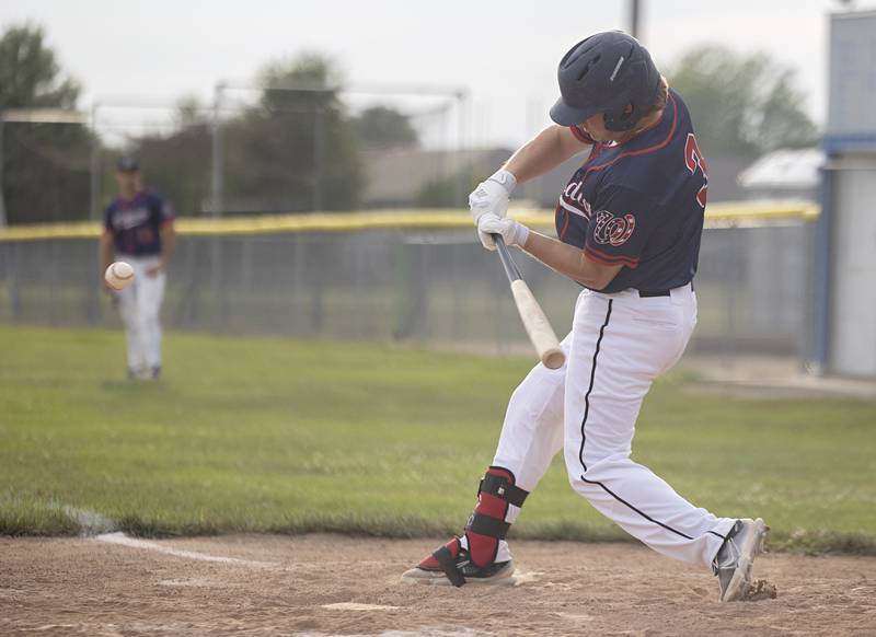 Chase Chappell (left) of the Whiteside Wildcats semi-pro baseball team smacks a home run against Palmer Wednesday, July 19, 2023.