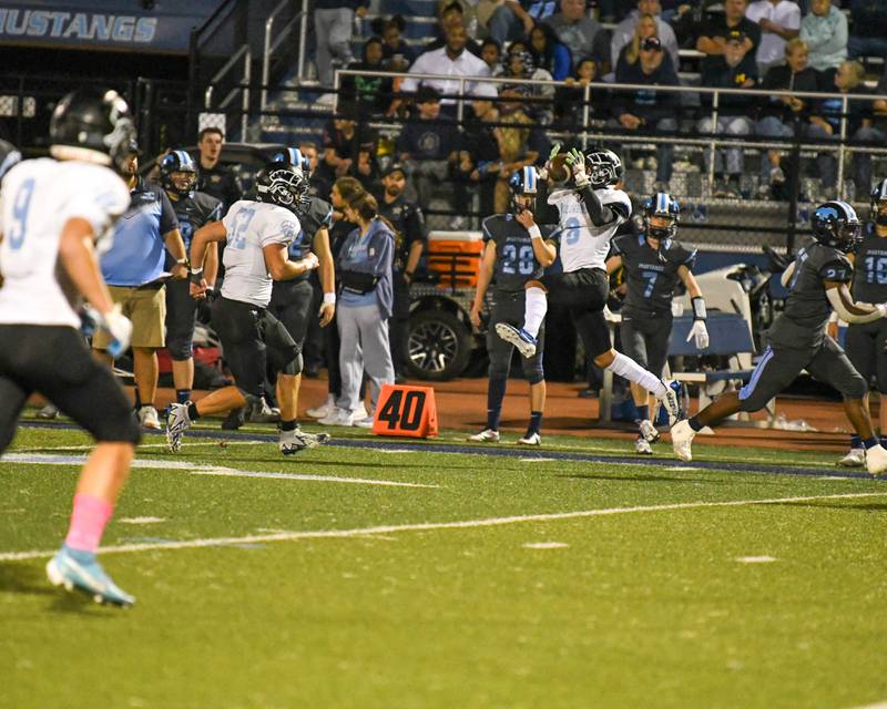 Willowbrook Martin Anfinson (8) intercepts the ball in the second quarter while taking on Downers Grove South on Friday Sep. 15, 2023, at Downers Grove South High School.