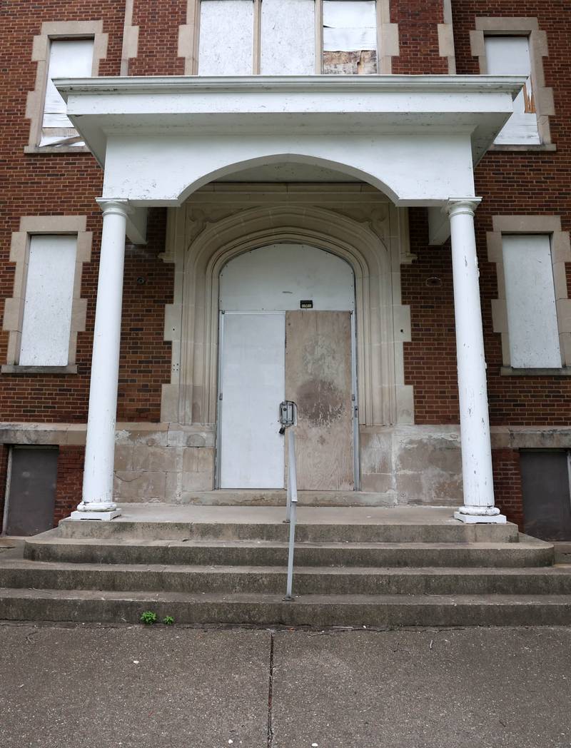 The front entryway of the long-vacant former St. Mary’s Hospital at 145 Fisk Ave. on Wednesday, July 30, 2025, in DeKalb.