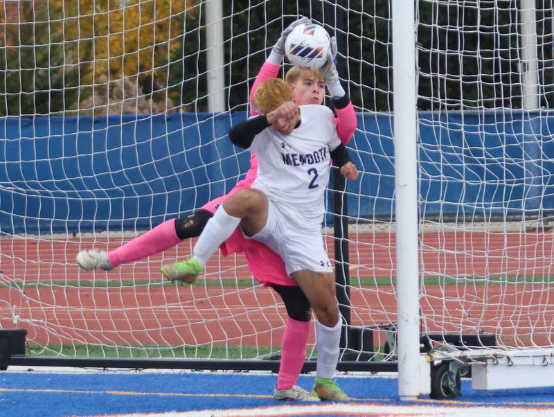 Mendota keeper Mateo Goy blocks a kick as teammate Angel Orozco helps during the Class 1A State title game on Saturday, Nov. 8, 2025 at Hoffman Estates High School.