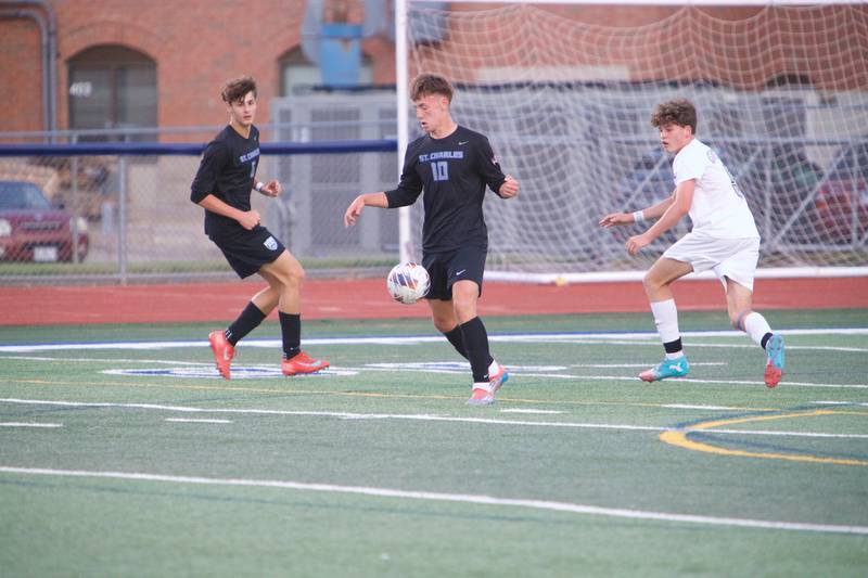 St. Charles North's Oliver Longosz looks to control the ball against Geneva on Tuesday, Sept. 9,2025 in St. Charles.