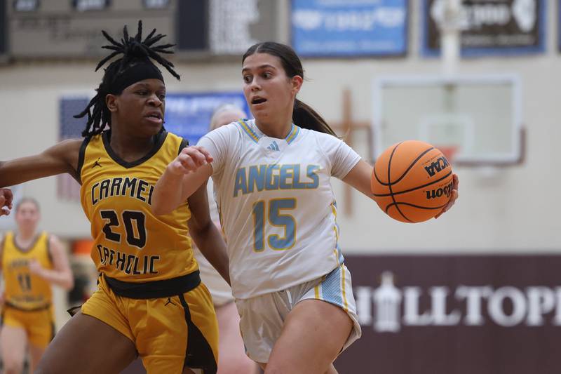Joliet Catholic’s Allison Lesters drives to the basket against Carmel on Wednesday, Jan 15, 2025 in Joliet.