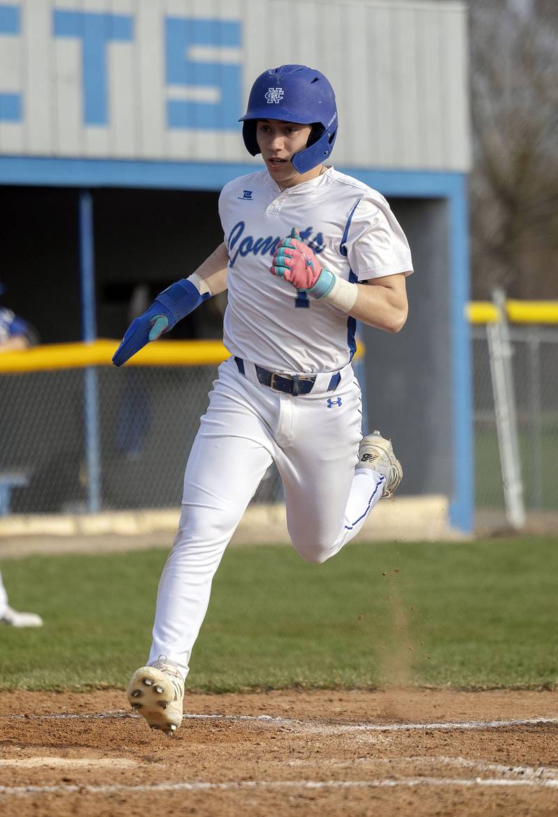 Newman’s Garret Matznick comes in to score against Princeton Thursday, April 10, 2025.