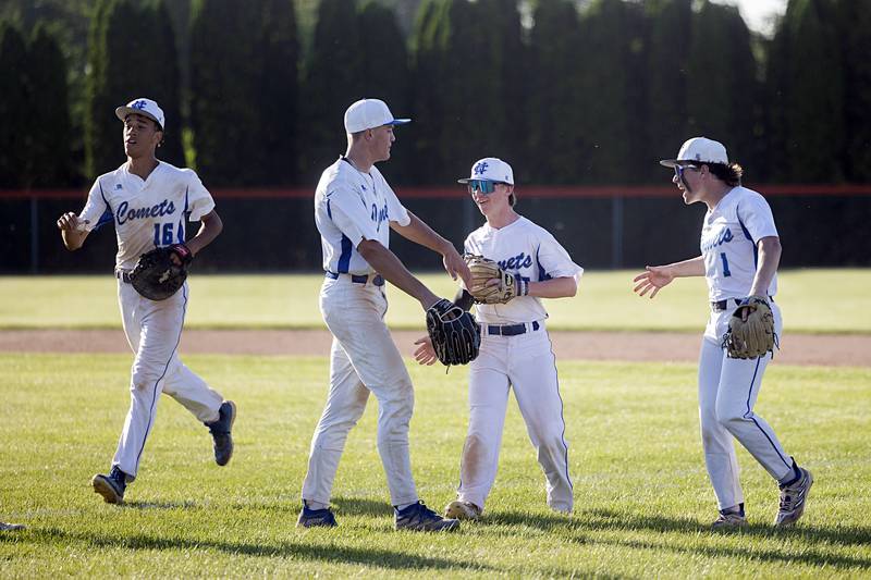 Newman baseball celebrates their 7-2 win over Stillman Valley Wednesday, May 22, 2024 in the Class 2A sectional semifinal in Byron.