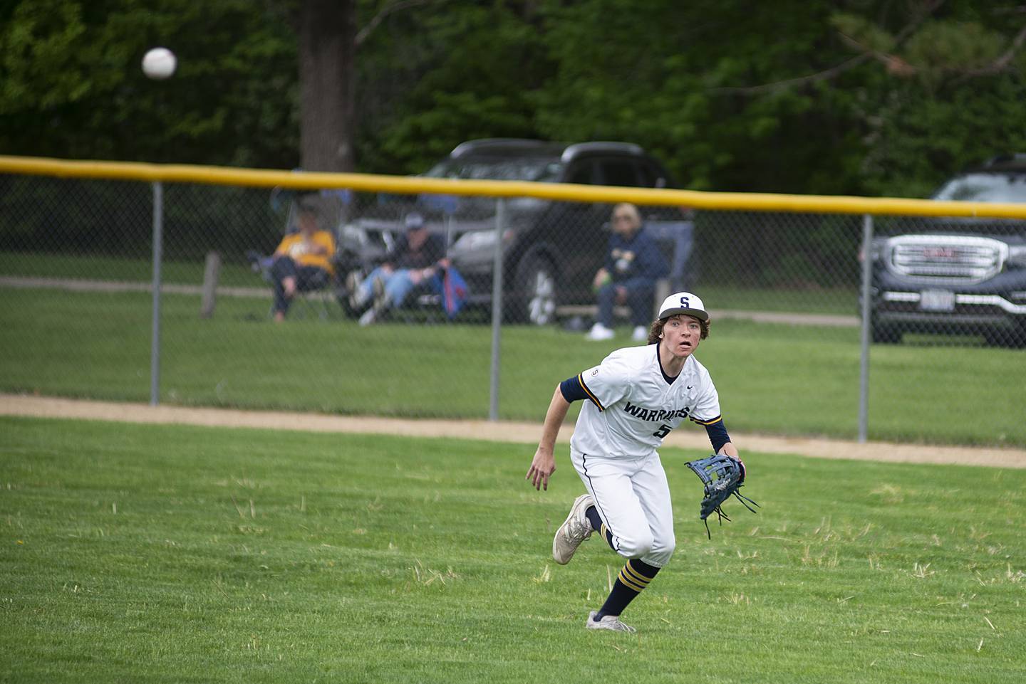 Sterling’s Ryan Dir tracks down a right field hit Tuesday, May 17, 2022 against Dixon.