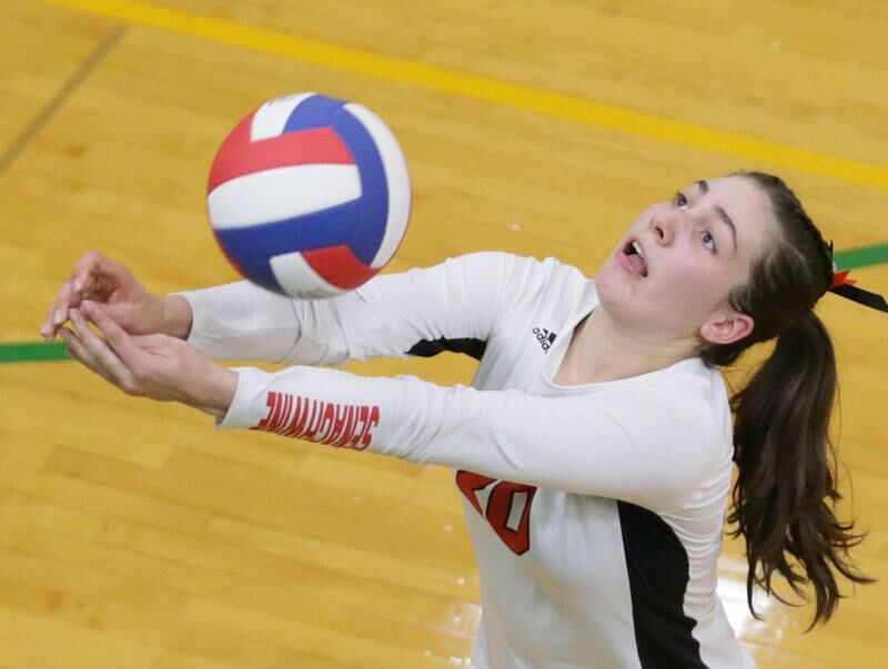 Henry's Catherine Miller hits the ball against Putnam County in the Tri-County Conference Tournament on Monday, Oct. 10, 2022 in Seneca.