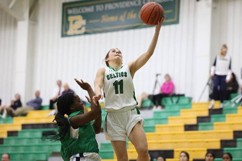 Providence’s Elaina Utz lays in the shot against IMSA in the Class 3A Providence Regional Semifinal on Tuesday, February 14th.