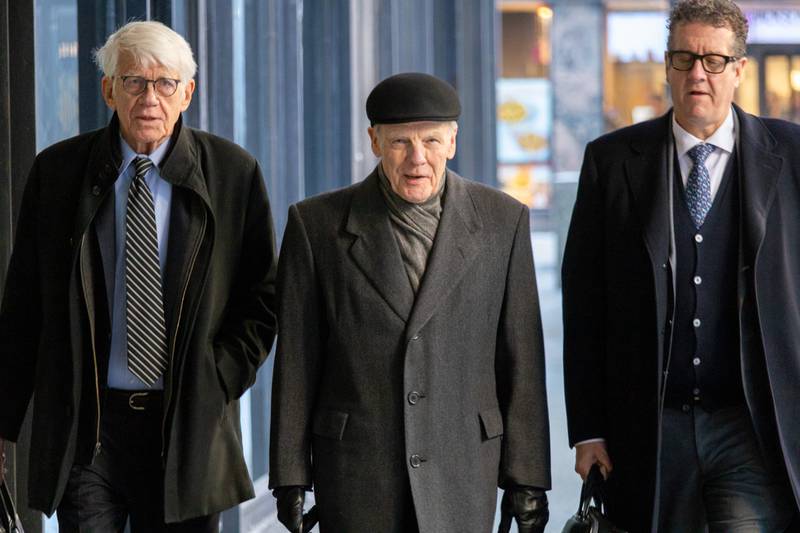 Former Illinois House Speaker Michael Madigan walks toward the Dirksen Federal Courthouse flanked by his attorneys Tom Breen and Todd Pugh ahead of a fourth day of closing arguments in his federal corruption trial.