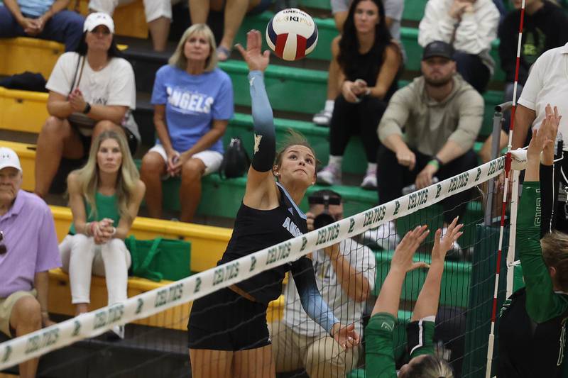 Joliet Catholic's Ellie Blotnik goes for the kill against Providence on Thursday, Sept. 19, 2024 in New Lenox.