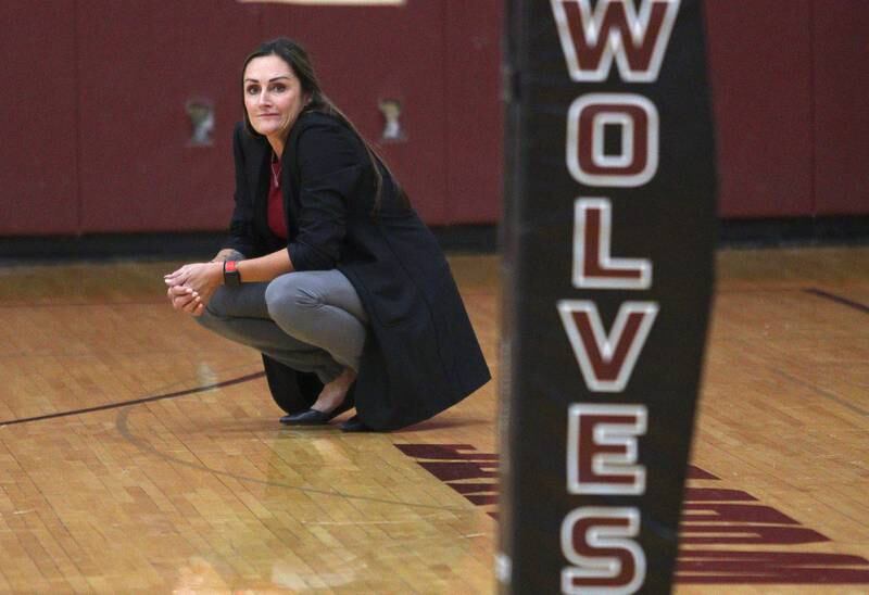 Prairie Ridge’s Head Coach Hilary Agnello guides the Wolves against Hampshire during varsity volleyball on Thursday, Oct. 3, 2024, at Prairie Ridge High School in Crystal Lake.