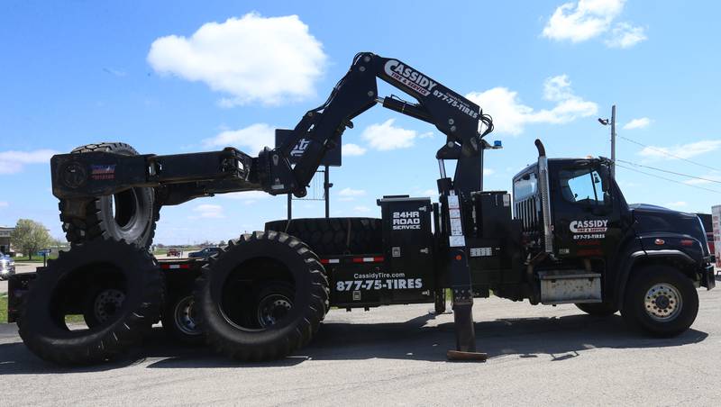 A large Cassidy Tire truck welcomes visitors to their open house on Saturday April 26, 2025 in Peru. The new location is located at 1414 38th Street in Peru. The event had giveaways, food truck and much more.