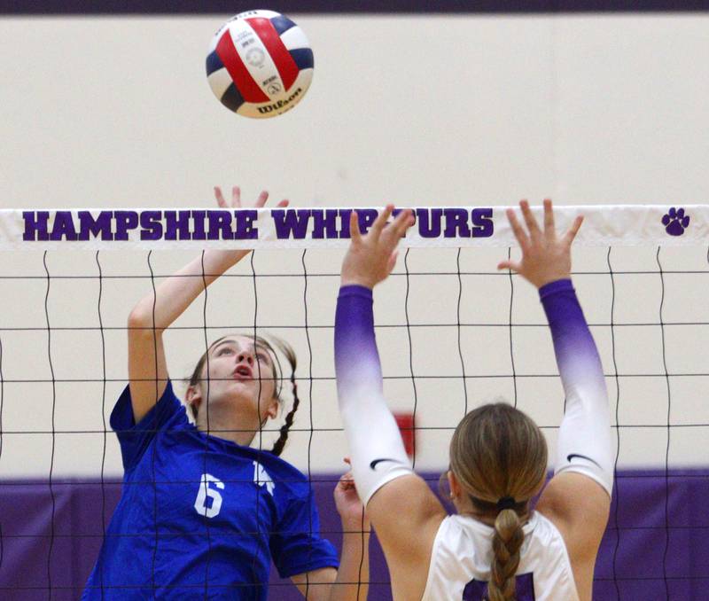 Woodstock’s Samantha Lamirand sends the ball over the net against Hampshire in varsity volleyball tournament action on Saturday, Sept. 21, 2024, at Hampshire High School in Hampshire.