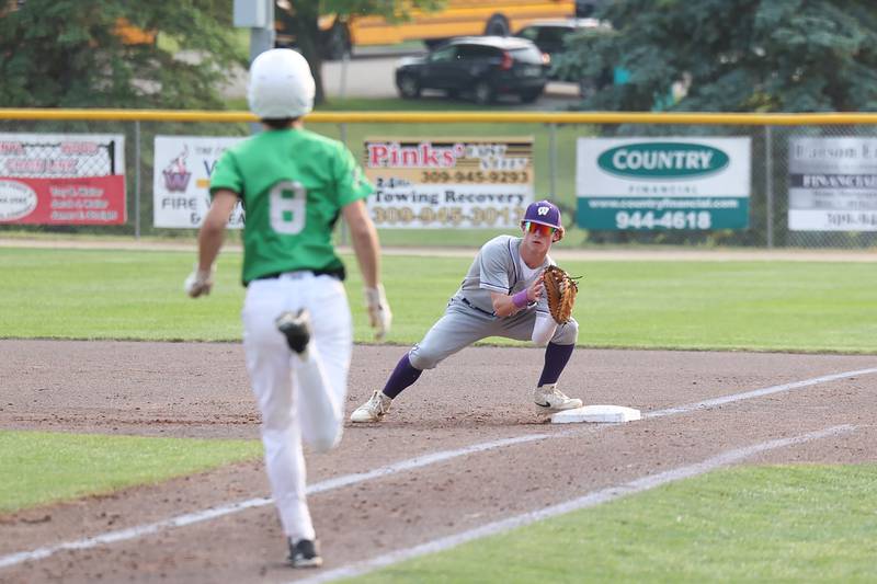 Wilmington's Bobby Phillips catches the out at first base during the Wildcats' 4-0 loss to Eureka in the IHSA Class 2A Geneseo Super-Sectional on Monday, June 2, 2025.