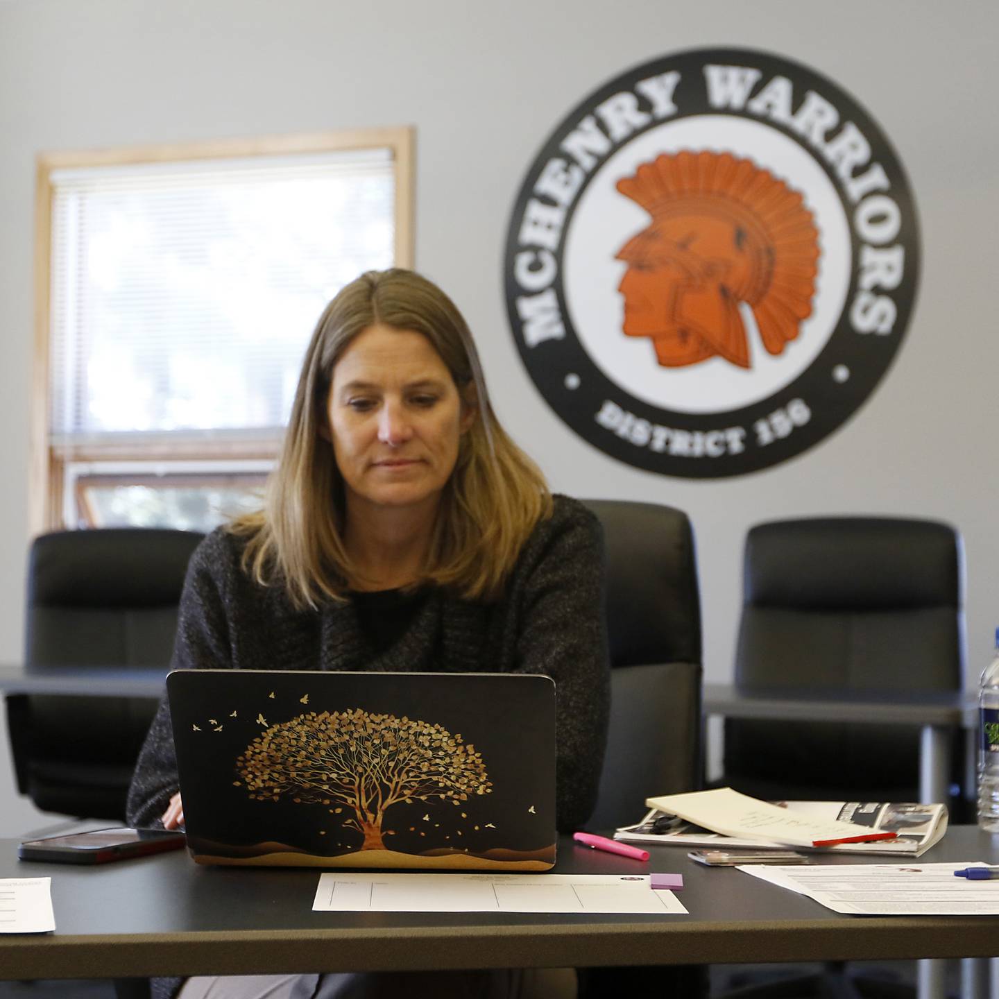 District 156’s Shae Gibour, the director of Special Services, works as she wait for job seekers to come to the board room for a job fair Wednesday,  Sept. 28, 2022, at the McHenry Community High School District Office. The district is looking to fill several available positions in the school district.