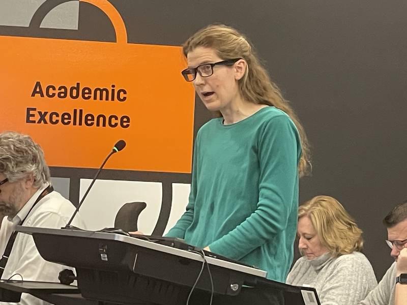 Erin Grych speaks out Tuesday, March 4, 2025, in opposition to a staffing request for a new associate superintendent position during the public comment section of the DeKalb School District 428 Board meeting.