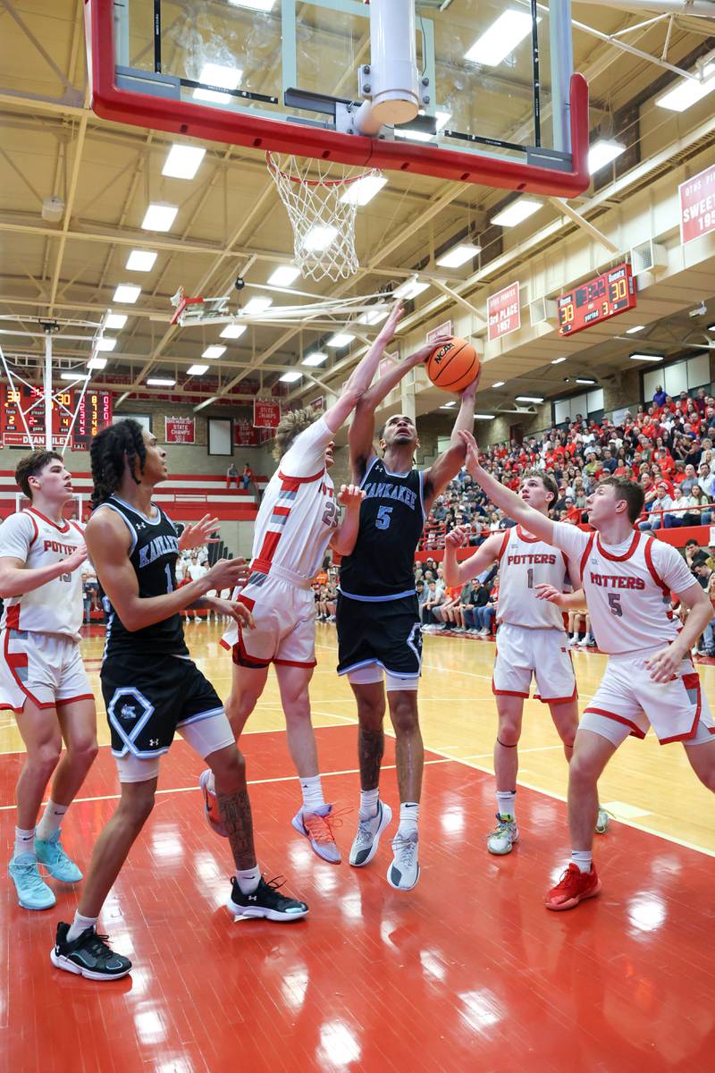 Kankakee's EJ Hazelett looks to shoot under pressure during the Kays' 61-48 loss to Morton in the IHSA Class 3A Ottawa Sectional championship on Friday, March 6, 2026.