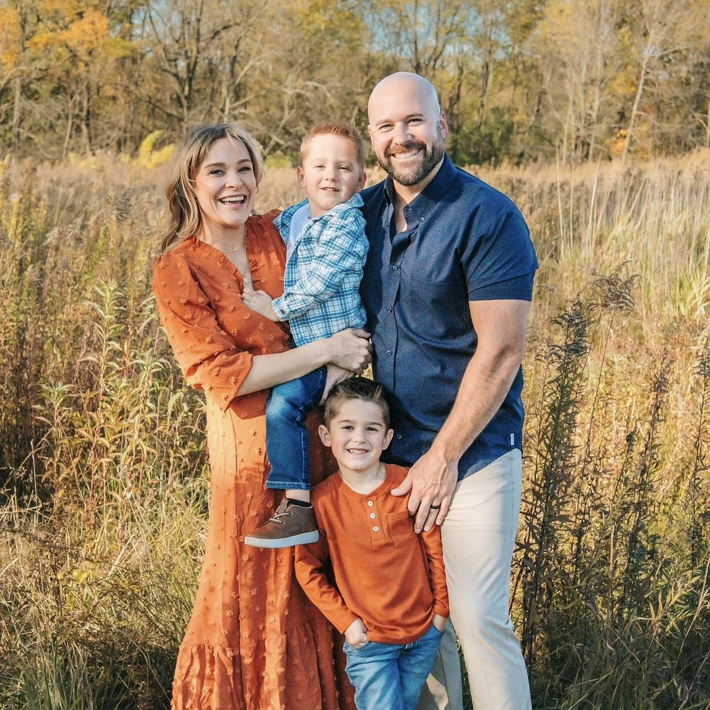 Rec Haus owner Erik Gilly poses with his wife Morgan and their sons Ethan (below), 6, and Jax (above), 4, at LeRoy Oakes Forest Preserve in St. Charles.