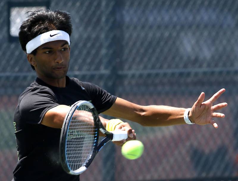 Fremd's Ved Mistry returns the ball during an IHSA 2A boys doubles tennis match Thursday, May 25, 2023, at Buffalo Grove High School.