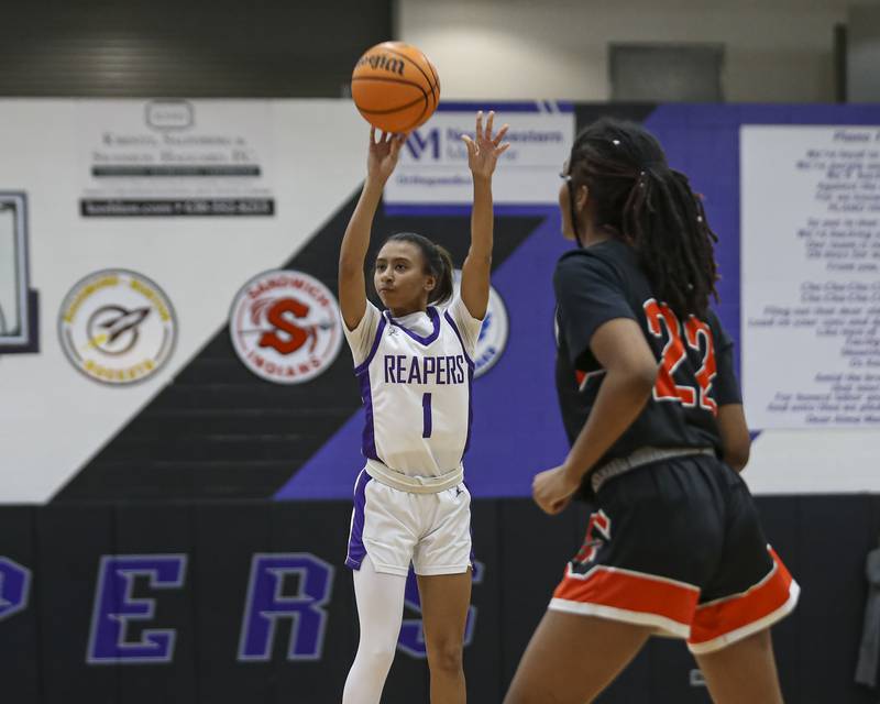 Plano's Le'Niya Viser (1) shoots a jumper during their basketball game between Sandwich at Plano Tuesday, Dec 2, 2025 in Plano.
