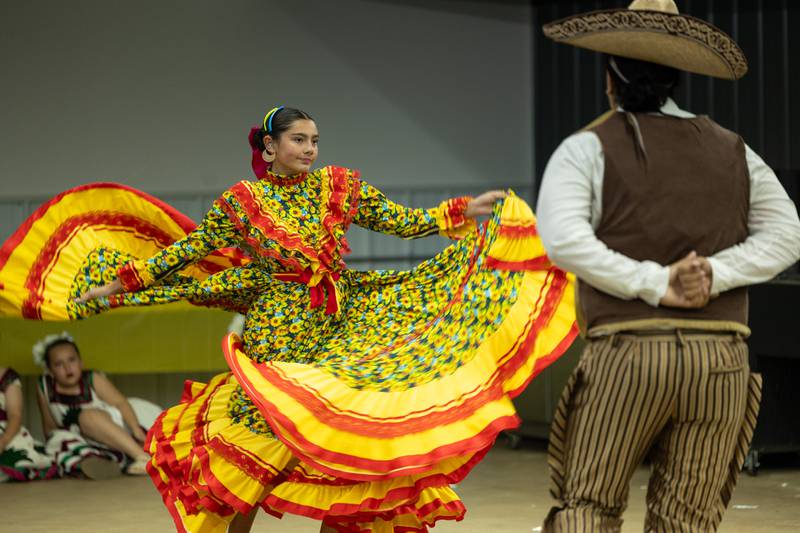 (from left) Emiliana Casas and Emiliano Casas perform dance at the 'Where Our Paths Meet' screening event on Sunday, Sep 7, 2025 at Diaz Banquet Center in Mendota.