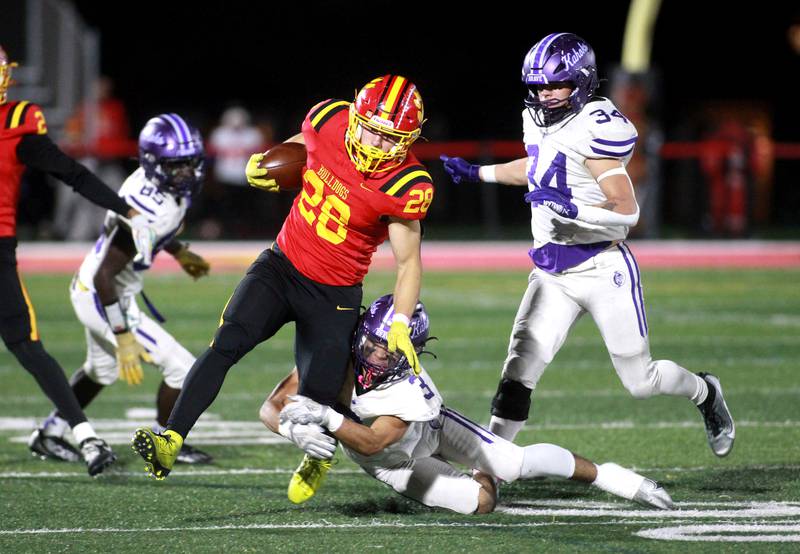Batravia’s Nathan Whitwell carries the ball during a Class 7A first-round game against Collinsville on Friday, Nov. 1, 2024 in Batavia.