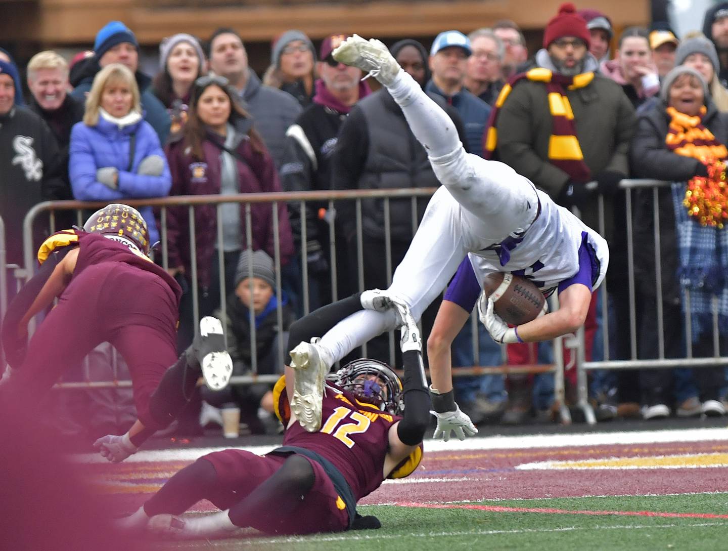 Montini's Sean Hubeny (12) makes a touchdown saving tackle of Wilmington's Ryan Kettman during a Class 3A semifinal game on November 23, 2024 at Montini Catholic High School in Lombard.
