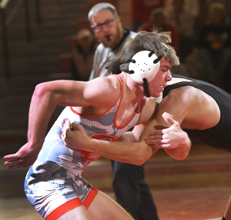 Oregon's Jackson Messenger (left) wrestles Byron's Dylan Dach at 157 pounds during the Oregon Quad meet on Saturday, Jan. 17, 2026 at the Blackhawk Center in Oregon.