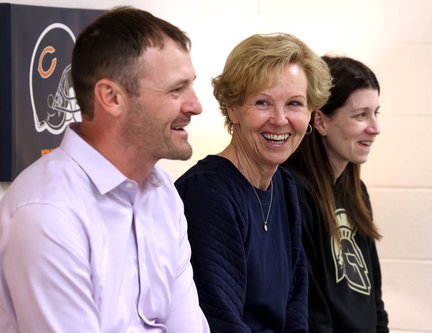 Dan Wheeler, (left) a fifth grade teacher, Deb Wheeler, a paraprofessional, and 	
Whitney Wheeler, (right) a third grade teacher,  who all work at South Prairie Elementary School in Sycamore, have a laugh as they talk Friday, April, 11, 2025, at the school, about the benefits and enjoyment that comes from working together in the same building.