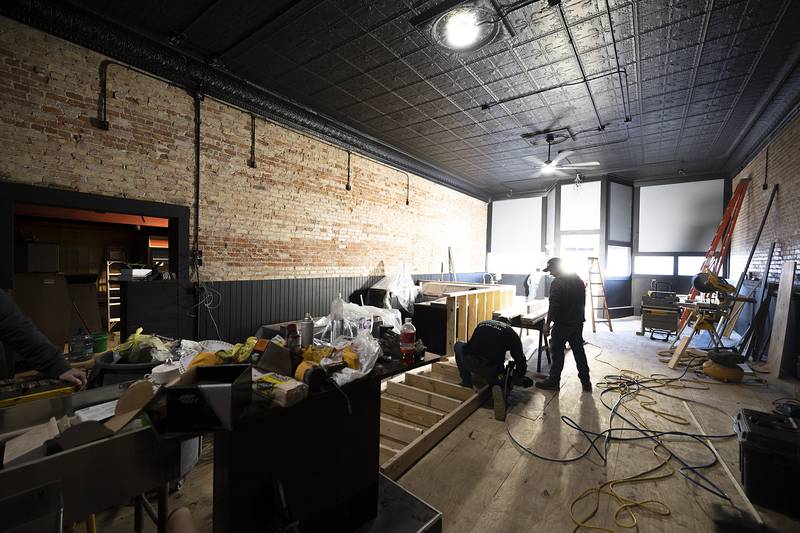 PJ’s II in downtown Rock Falls is getting a complete renovation as seen Thursday, Jan. 23, 2025. Paneling was removed to expose the original brick, the tin ceiling was painted, flooring redone and the round center bar is being replaced.