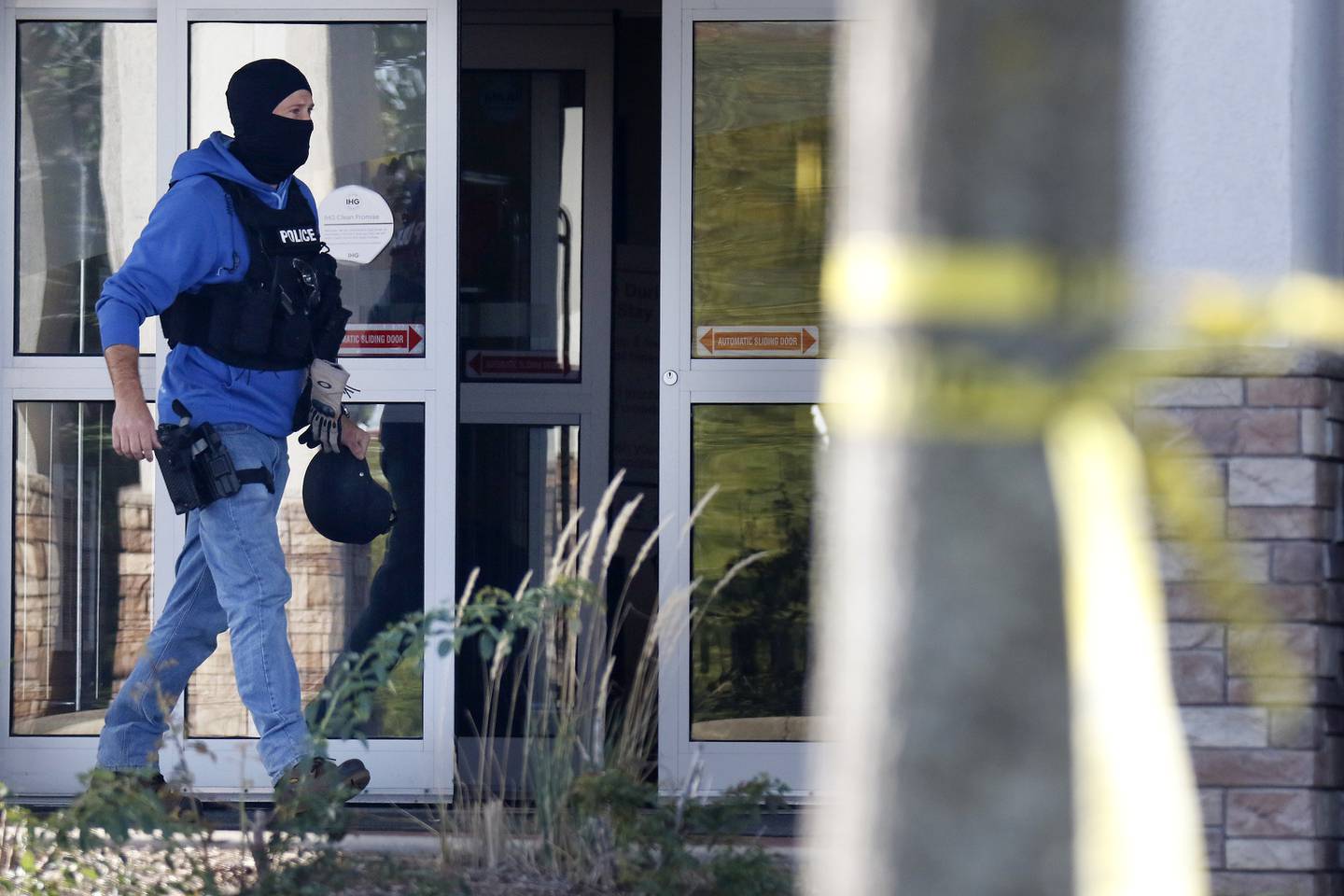 Police, sheriff's deputies, and law enforcement in SWAT gear were on hand to handle a situation Wednesday, Oct. 27, 2021, at the Holiday Inn Express across from Jacobs High School in Algonquin.