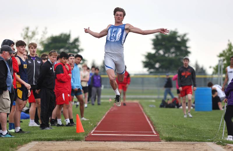 Princeton's Teegan Davis competes in the long jump Wednesday, May 18, 2022, at the Class 2A boys track sectional at Rochelle High School.