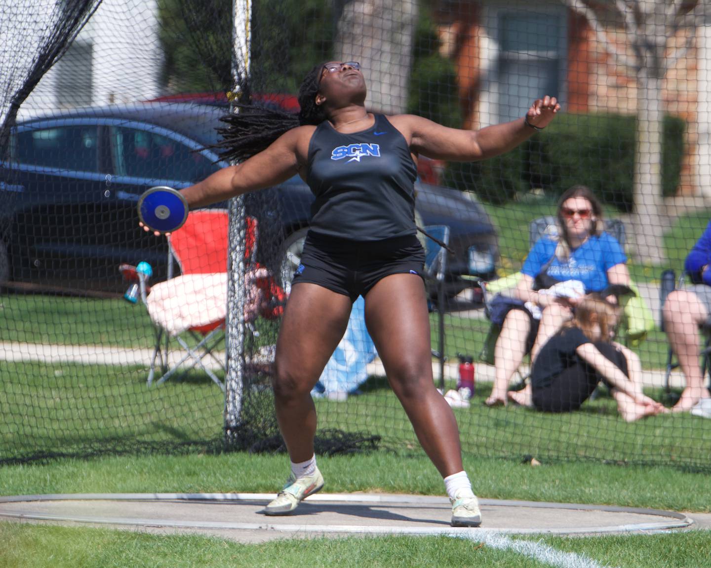 St. Charles North's Tosin Oshin competes in the Girl's Discusat the 31st Annual Mike VanDeveer Track and Field Invitational on Saturday April 15,2023 in Geneva.