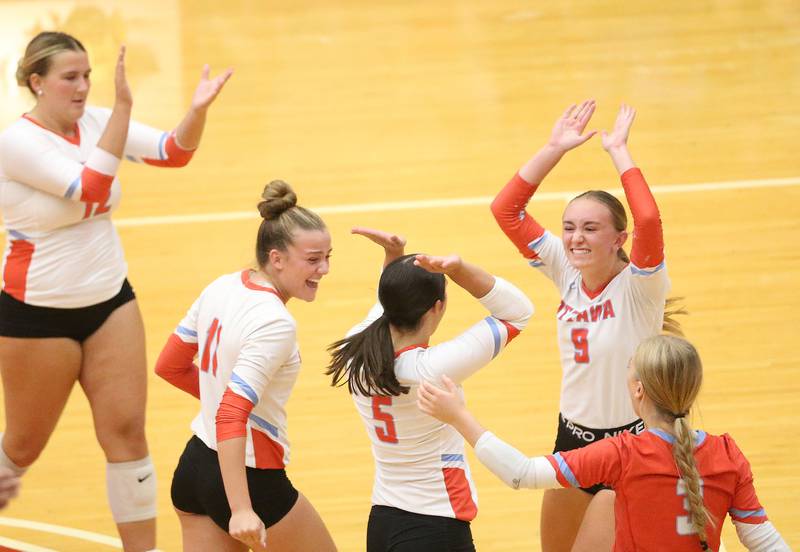 Members of the Ottawa volleyball team (from left) Kerrigan Cooney, Bell Markey, Emma Molina, Ashlynn Ganiere and Kendall Biba celebrate after scoring a point against Pontiac on Tuesday, Sept. 9, 2025 at Kingman Gymnasium.
