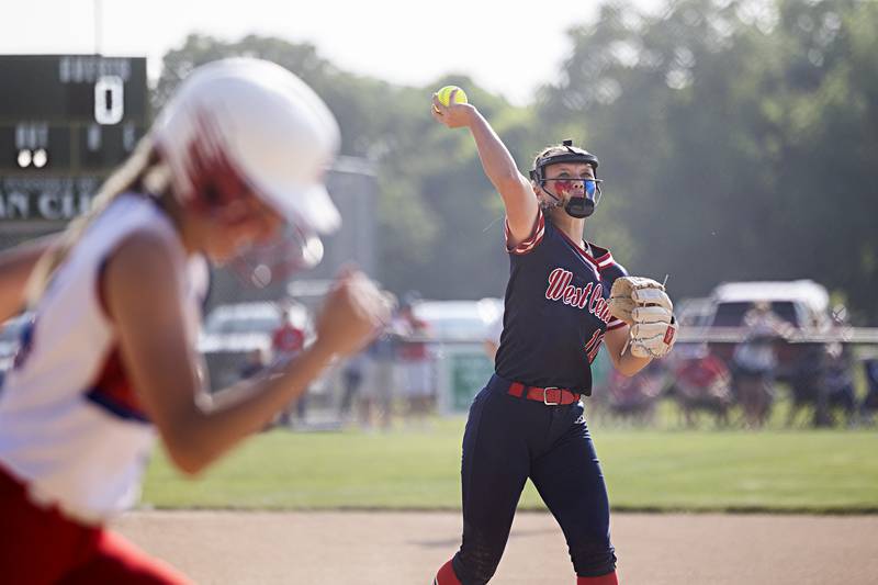 West Central’s Addie Seitz throws to first for an out against Morrison on Wednesday, May 24, 2023 during their Class 1A sectional semifinal at St. Bede Academy.