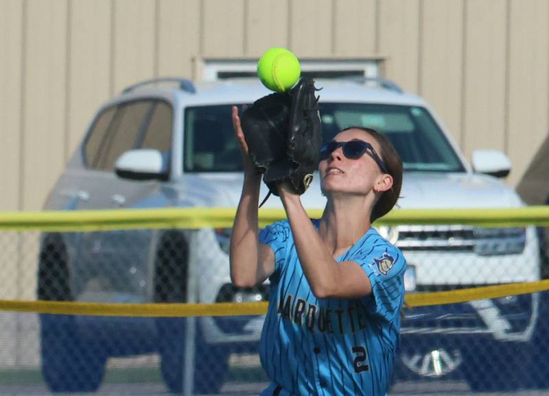 Marquette's Madisyn Trainor makes a catch in center field on Tuesday, April 23, 2026 at June Cross Field in Ottawa.