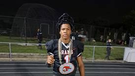 Montii Perry redeems himself with fumble return for a TD to lead Glenbard East to wild win over Willowbrook