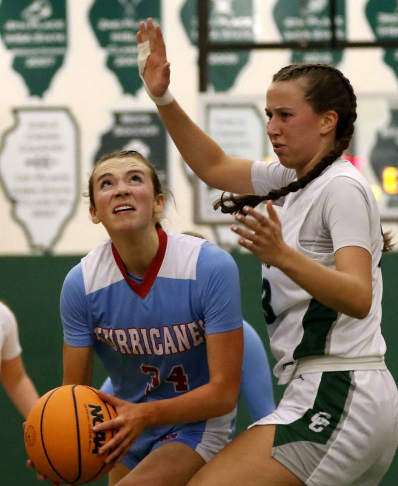 Marian Central's Juliette Huff drives to the basket against Grayslake Central's Madison Hoffmann during a nonconference girls basketball on Monday, Jan. 13, 2025, at Grayslake Central High School.