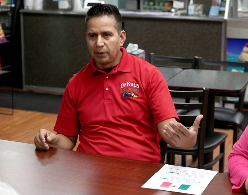 Martin Garcia, owner of DeKalb Fresh Market, talks about his reasons for participating in a Day Without Immigrants Monday, Feb. 3, 2025, during a meeting at Flamingo Restaurant & Ice Cream in DeKalb. More than 30 DeKalb County businesses closed on Monday to show solidarity in their stance against President Donald Trump’s anti-immigration policy.