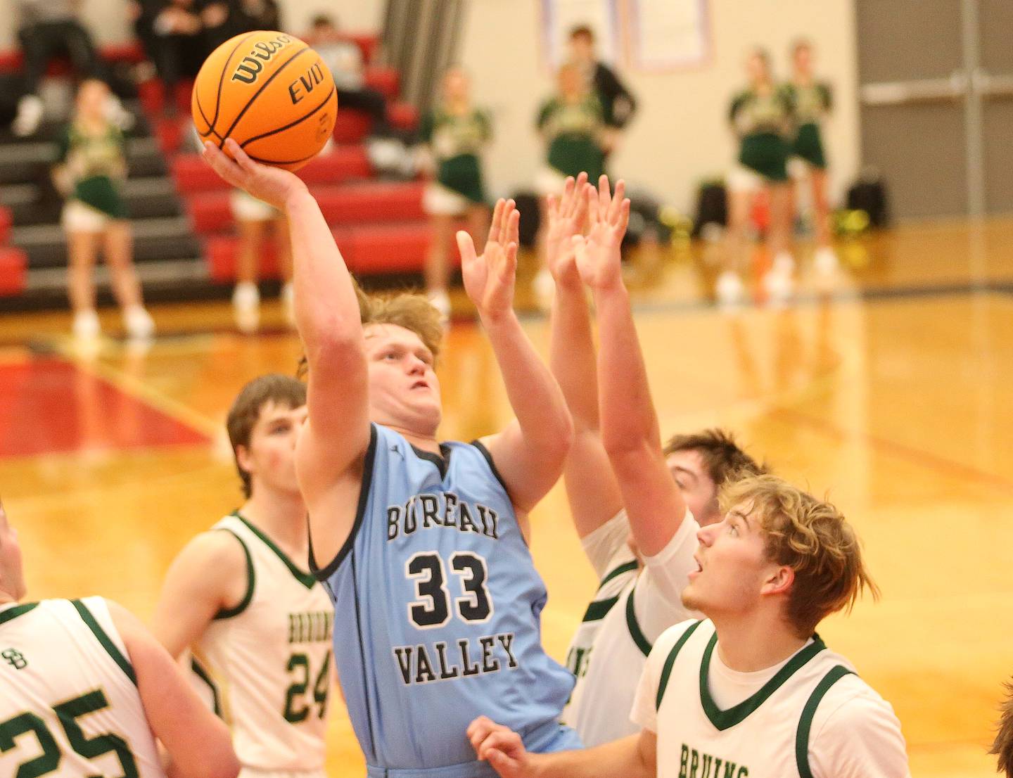 Bureau Valley's Elijah Endress eyes the hoop as St. Bede's Kaden Newman defends during the 50th annual Colmone Classic on Thursday, Dec. 12, 2024 at Hall High School.