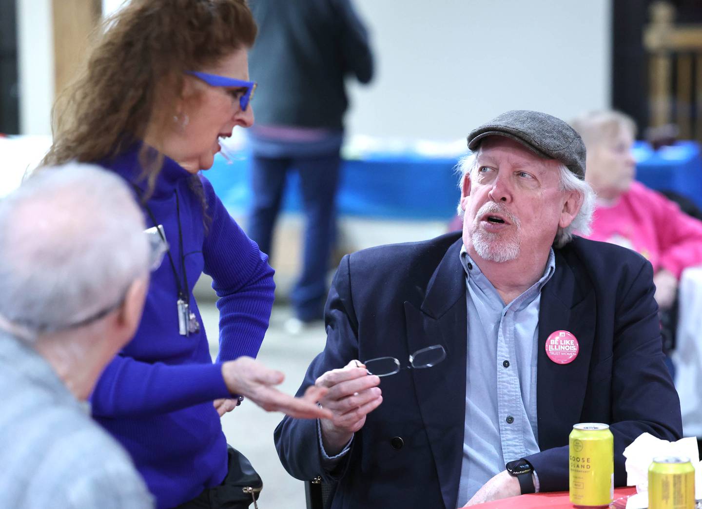 Democrat Stewart Ogilvie, (right) DeKalb County Board candidate for District 4, talks to DeKalb County Democratic Party chairman Anna Wilhelmi Tuesday, Nov. 8, 2022, during an election night watch party at River Heights Golf Course in DeKalb.