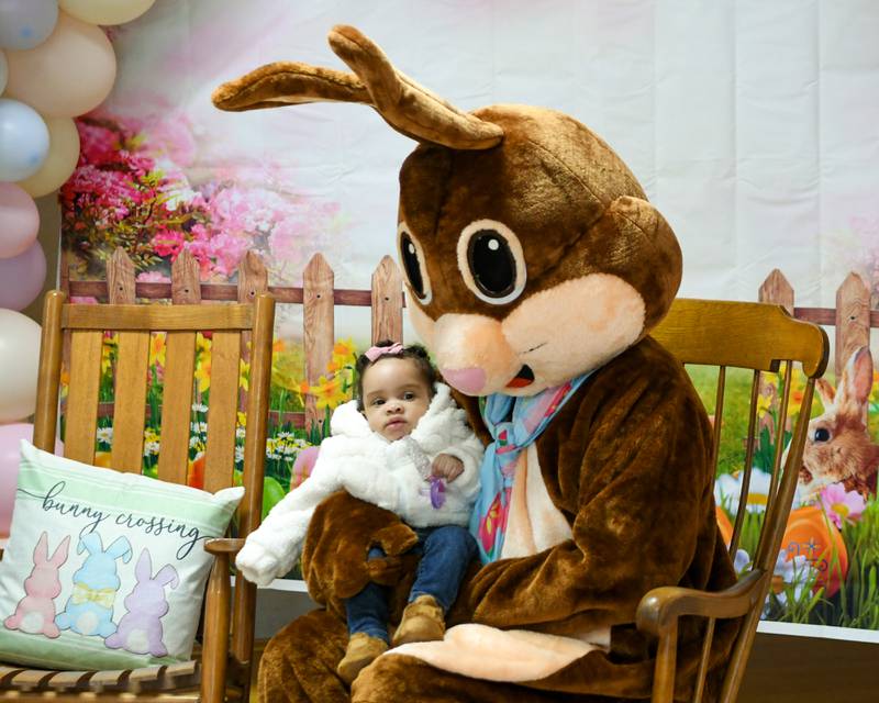 Jelani Walker, 5 months, gets her photo taken with the Easter Bunny during the DeKalb Park District's annual Breakfast with the Bunny on Saturday, March 23, 2024, at Hopkins Park in DeKalb.