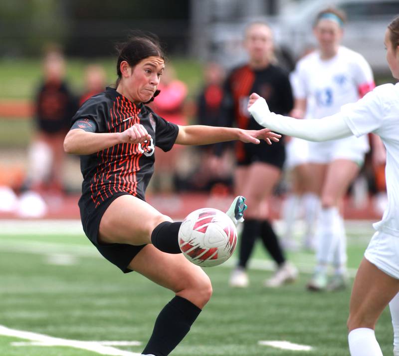 St. Charles East’s Georggia Desario gets control of the ball during a game on Tuesday, April 1, 2025 against Burlington Central in St. Charles.