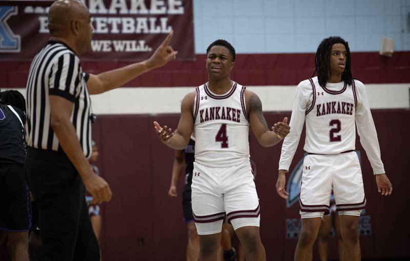 Kankakee's Myair Thompson, center, reacts to a foul call in the second half of a game against Thornton on Friday, December 12, 2025.